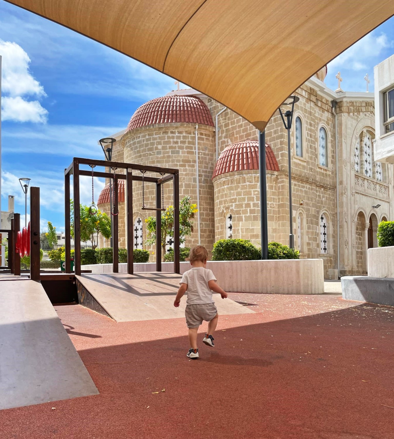 Iacob on a playground in Paphos Old Town Iacob on a playground in Paphos Old Town